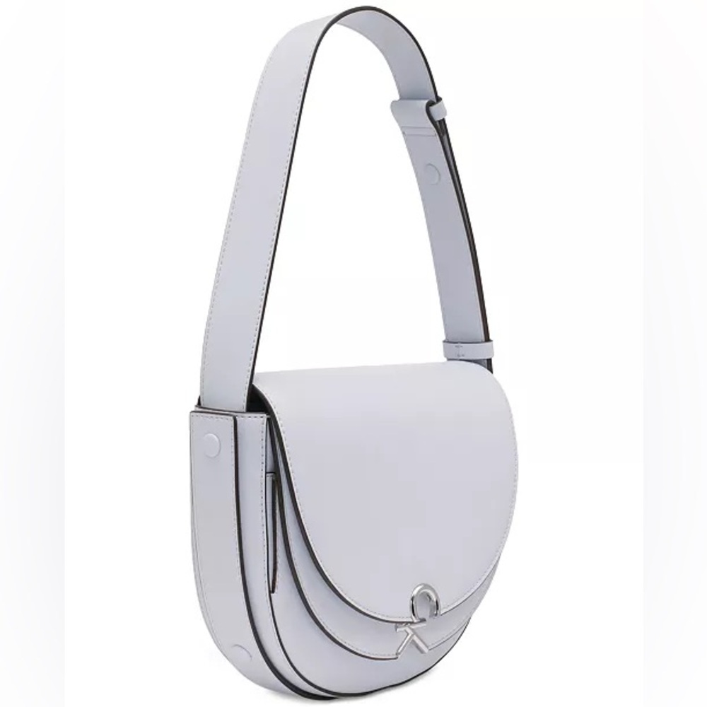 CALVIN KLEIN
Crisell Convertible Saddle Crossbody Artic